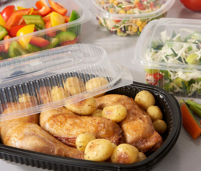 Photo of clear containers of mixed fruits