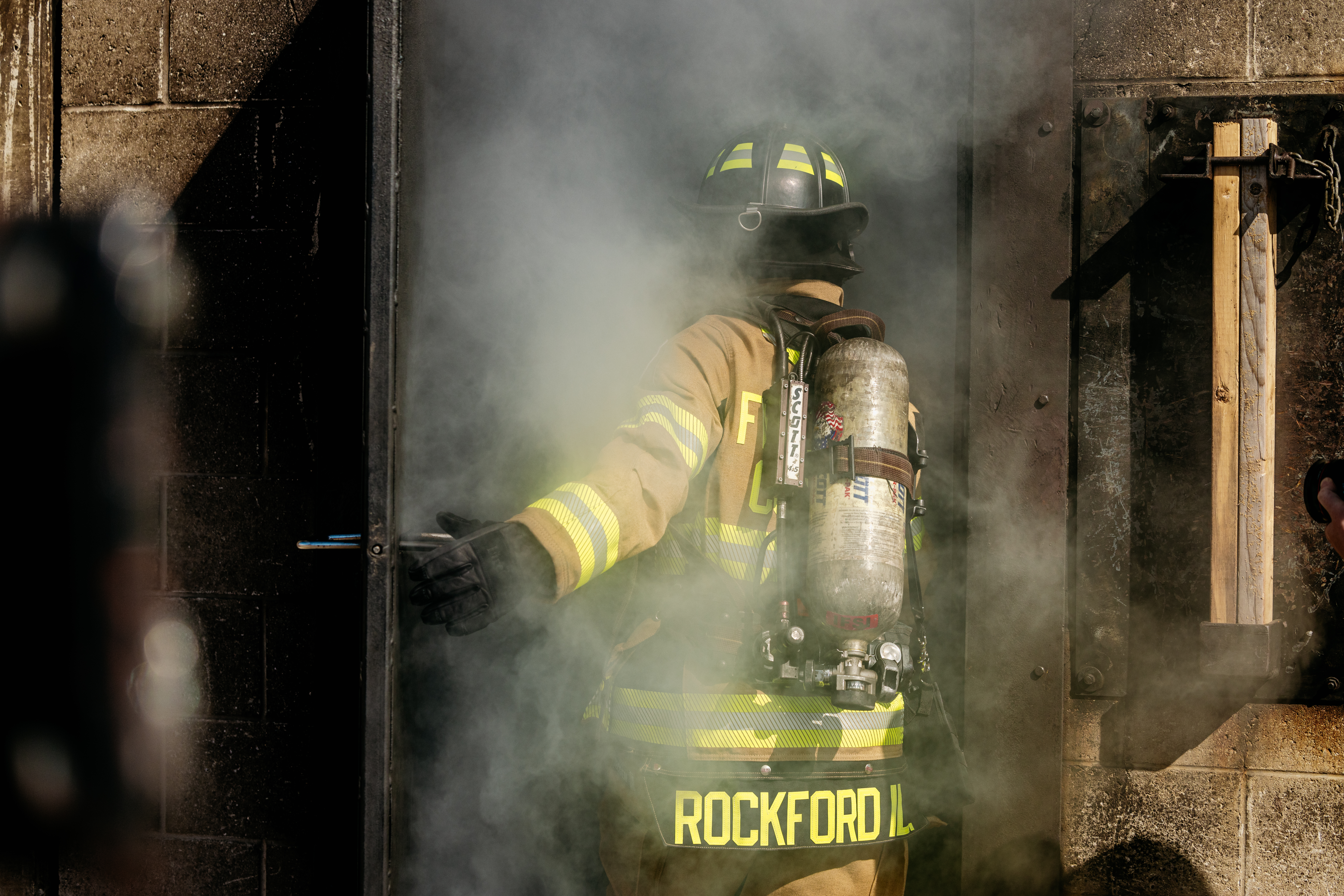 Picture of firefighting gear and fire scene